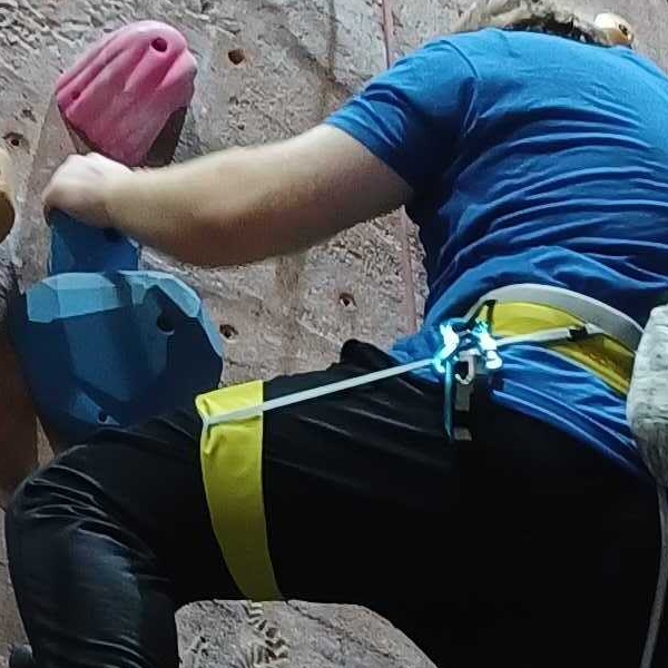 Adam climbing in the gym