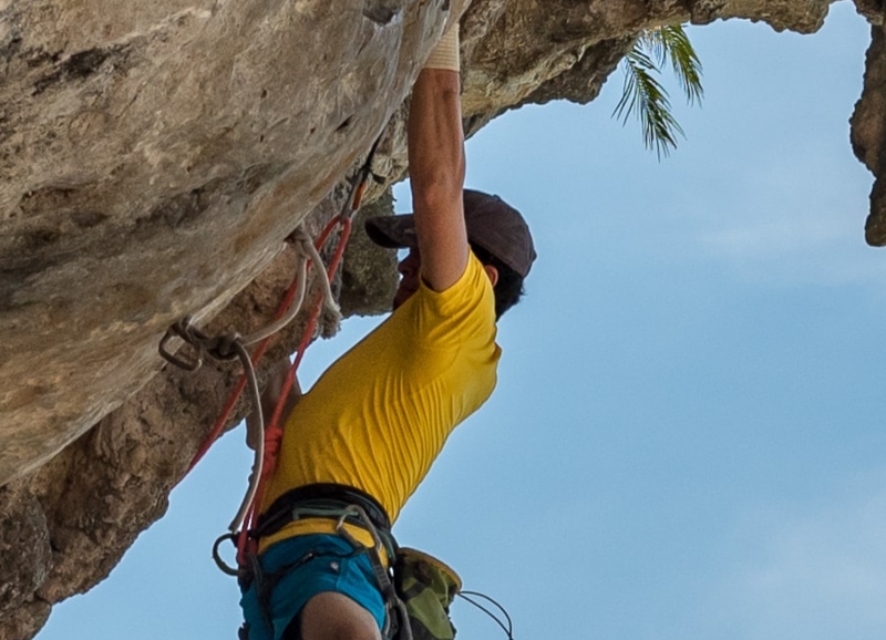 Person climbing in the beautiful mountains